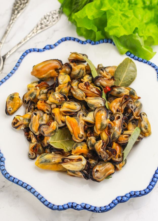Мідії мариновані в соєвому соусі та олії